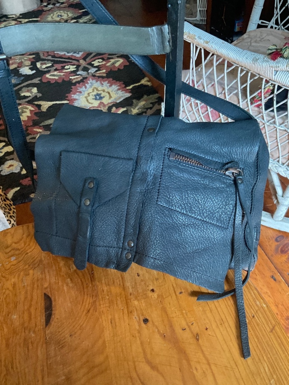 Linea Pelle black soft pebbled leather cross body messenger bag